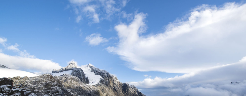 The Rwenzori Mountains feature dramatic peaks, lush forests, and diverse wildlife in East Africa's landscape